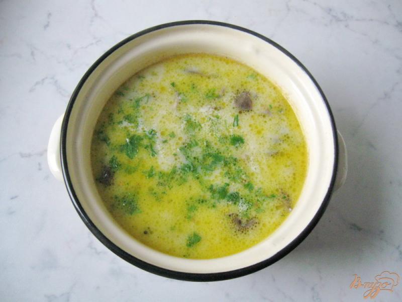 Фото приготовление рецепта: Гречневый суп с опятами и сливками шаг №8