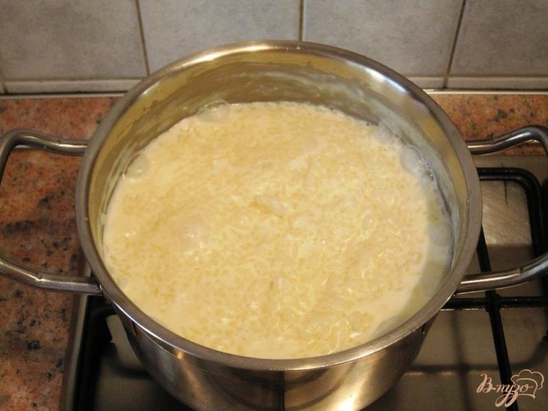 Фото приготовление рецепта: Рисовая каша на молоке шаг №4