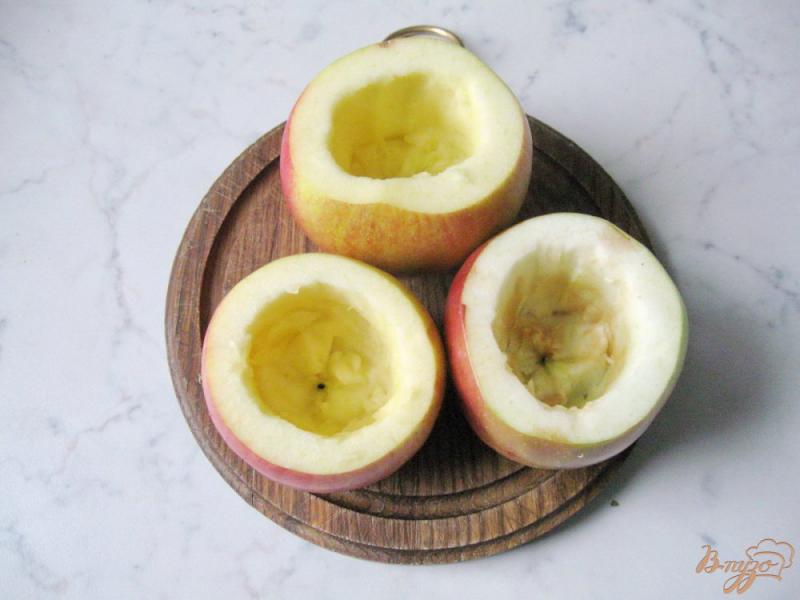Фото приготовление рецепта: Яблоки запеченные с рисом и изюмом шаг №6
