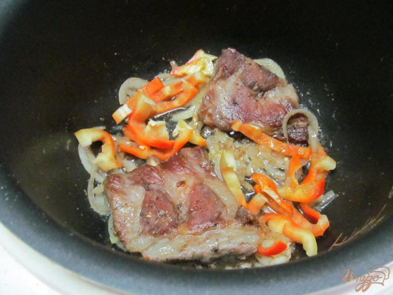 Фото приготовление рецепта: Свиные ребра с черносливом шаг №4