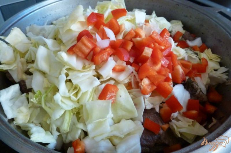 Фото приготовление рецепта: Овощное рагу со свиными ребрами шаг №4