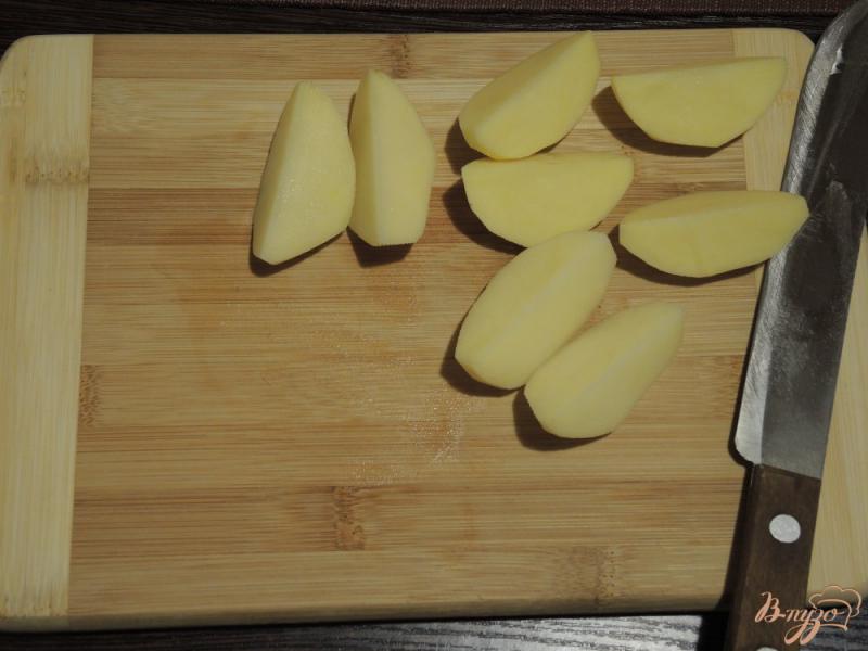 Фото приготовление рецепта: Курица в апельсиновом маринаде с картофельным гарниром шаг №4