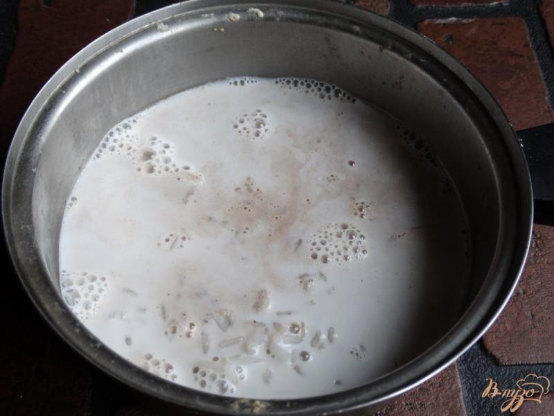 Фото приготовление рецепта: Шоколадная рисовая каша на завтрак шаг №5