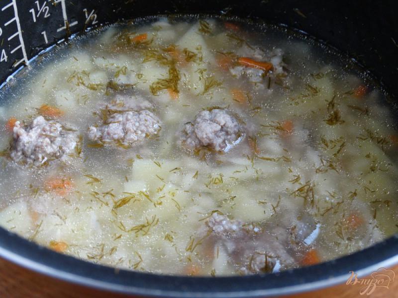 Фото приготовление рецепта: Суп с фрикадельками в мультиварке шаг №6