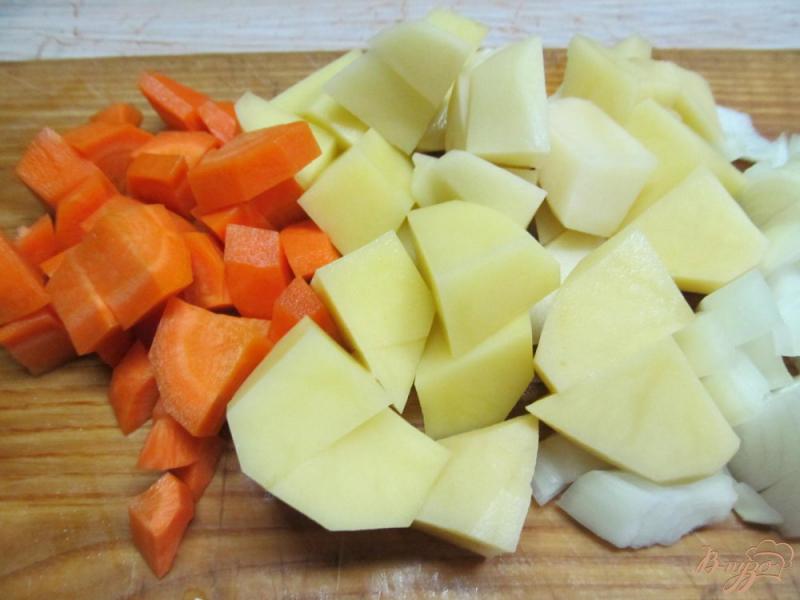 Фото приготовление рецепта: Суп-пюре из моркови с капустой и рисом шаг №2