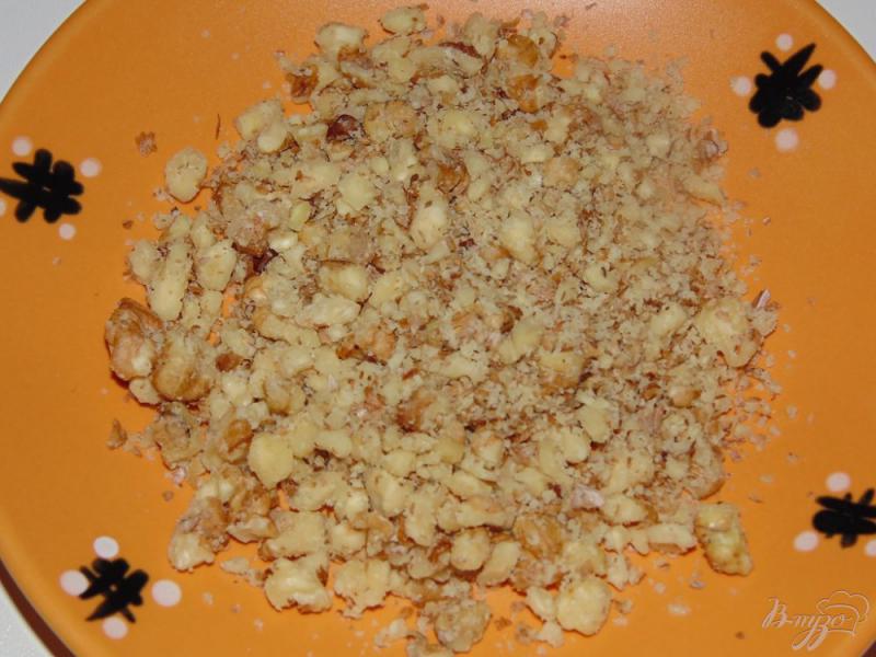 Фото приготовление рецепта: Овсяное печенье с грецкими орехами и изюмом шаг №3