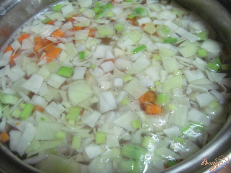 Фото приготовление рецепта: Суп с капустой и тыквой шаг №4