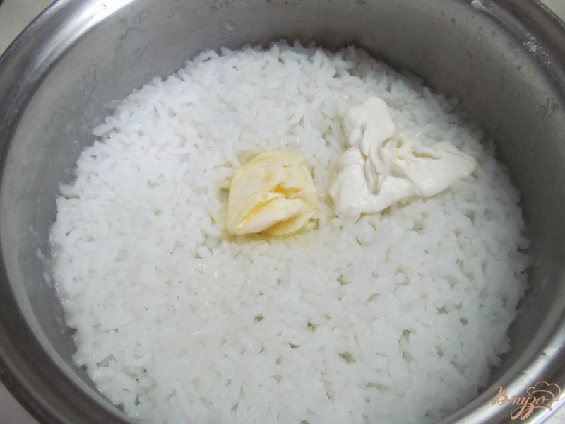 Фото приготовление рецепта: Рисовая каша с мандарином шаг №2