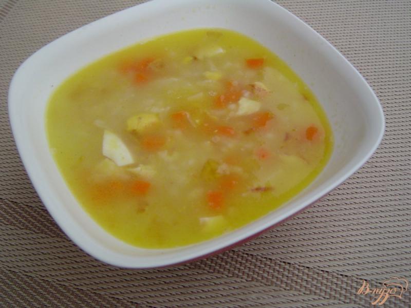 Фото приготовление рецепта: Суп рисовый с яйцом шаг №5
