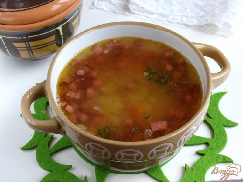 Фото приготовление рецепта: Суп из бобовой смеси с колбасой шаг №8