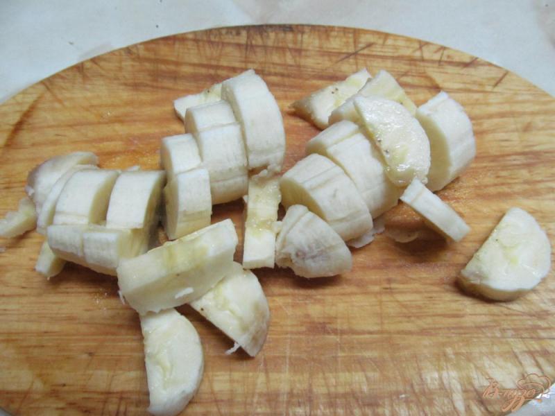 Фото приготовление рецепта: Рисовая каша с бананом и яблоком в мультиварке шаг №2