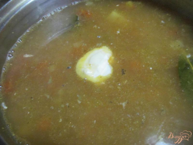 Фото приготовление рецепта: Суп с рыбными консервами шаг №6