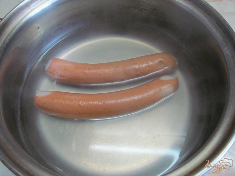 Фото приготовление рецепта: Сосиски в тесте с сыром и яйцом шаг №6