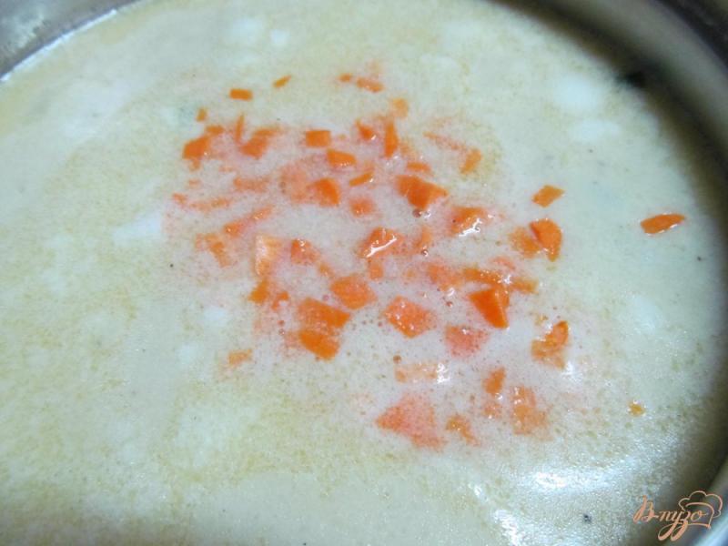 Фото приготовление рецепта: Сливочный суп с капустой и колбасой шаг №2