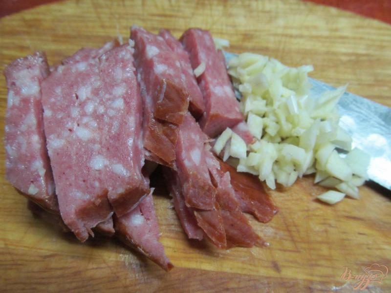Фото приготовление рецепта: Теплый салат из груши и брюссельской капусты шаг №2
