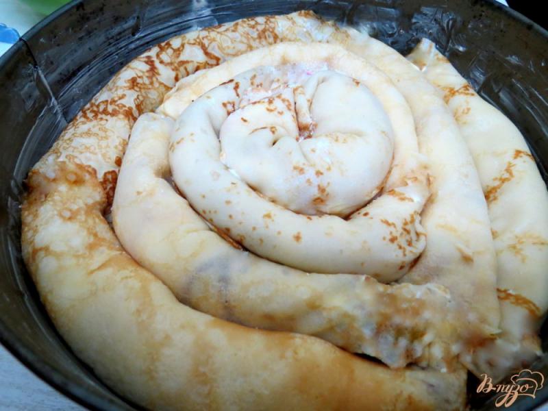 Фото приготовление рецепта: Пирог *Улитка* со сладкой начинкой. шаг №7
