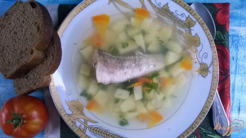 Фото приготовление рецепта: Рыбный суп из нототении с манкой шаг №5