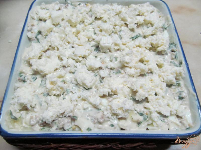 Фото приготовление рецепта: Запеканка из картофеля с фаршем и яйцом шаг №7