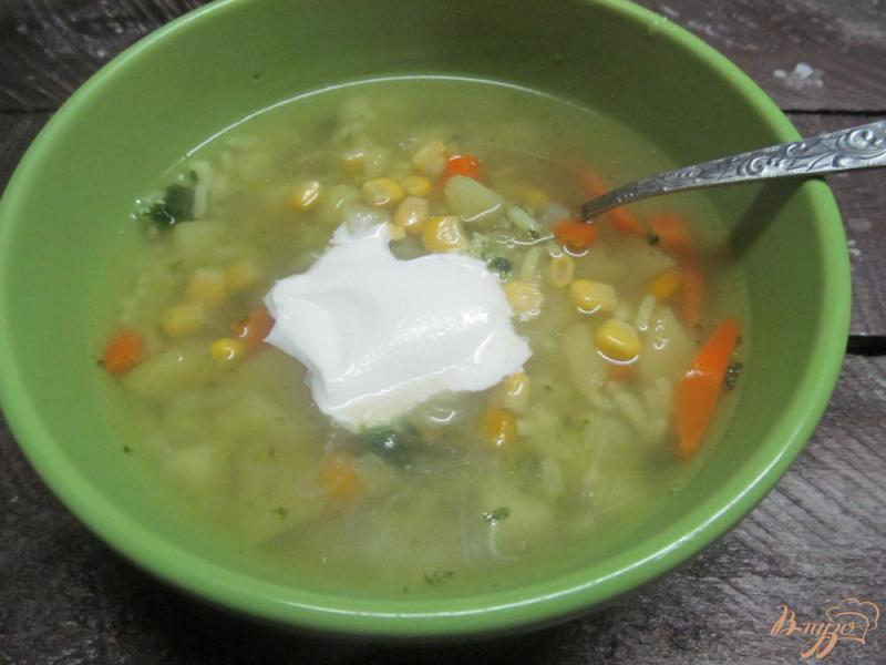 Фото приготовление рецепта: Суп с тыквой рисом и кукурузой шаг №5