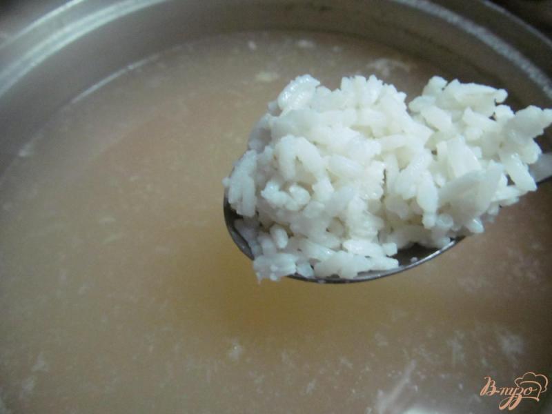 Фото приготовление рецепта: Суп с тыквой рисом и кукурузой шаг №4