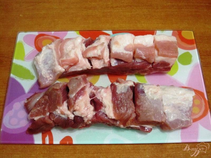 Фото приготовление рецепта: Свиные ребрышки в пикантном маринаде шаг №2