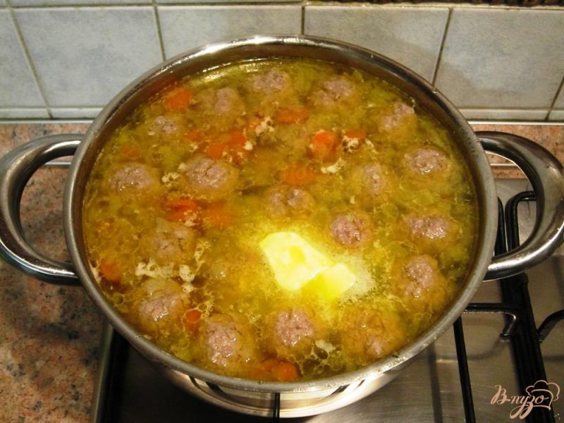 Фото приготовление рецепта: Суп с овощами и фрикадельками шаг №11