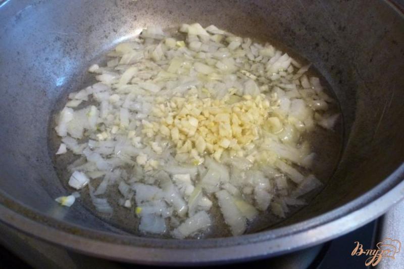 Фото приготовление рецепта: Ароматный гарнирный рис шаг №2