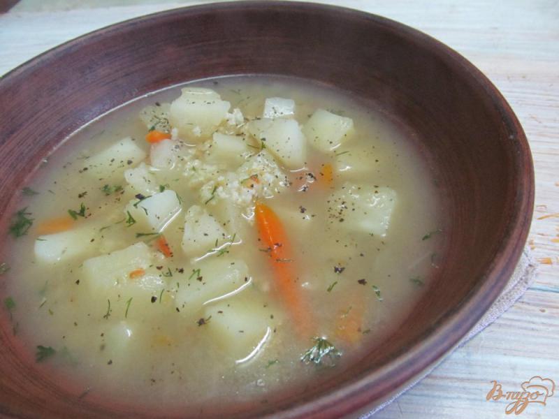 Фото приготовление рецепта: Суп на рыбном бульоне шаг №7