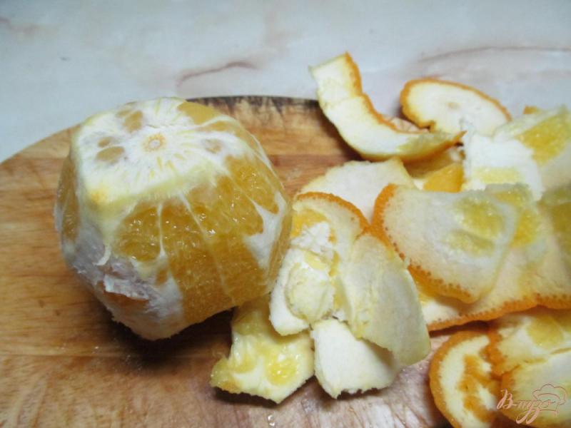 Фото приготовление рецепта: Смузи из апельсина дыни и малины шаг №2