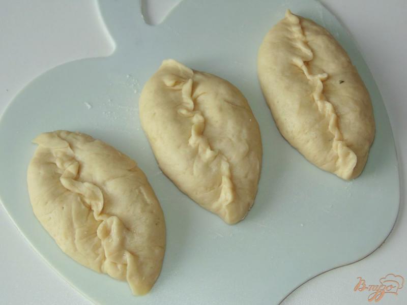 Фото приготовление рецепта: Духовые пирожки с начинкой из индюшиного мяса шаг №7
