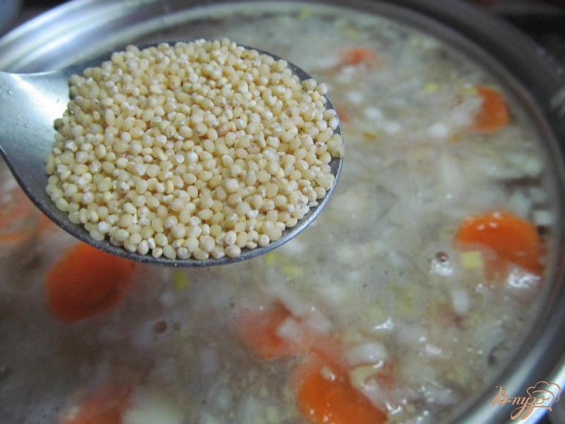 Фото приготовление рецепта: Суп с пшеном фасолью и замороженными овощами шаг №2