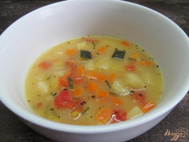 Фото приготовление рецепта: Суп с кукурузной крупой и замороженными овощами шаг №7