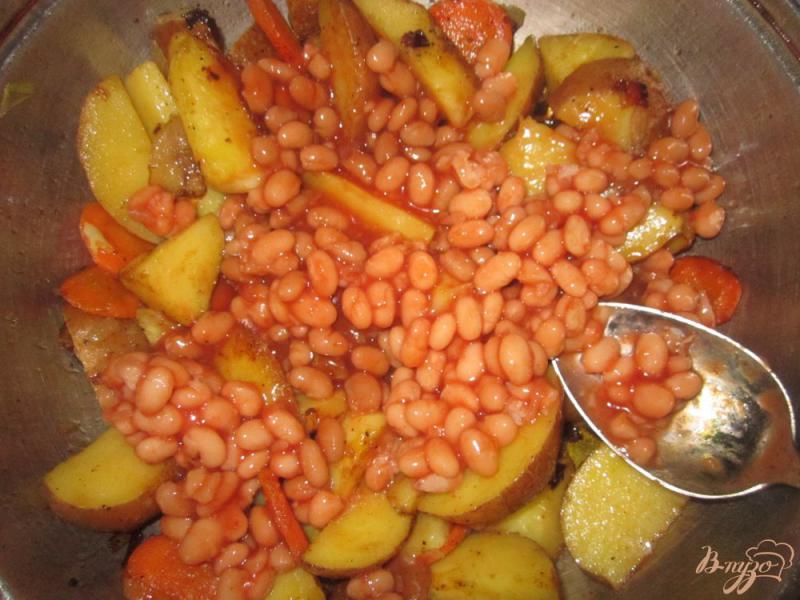 Фото приготовление рецепта: Свиные ребра запеченные с овощами и фасолью шаг №3