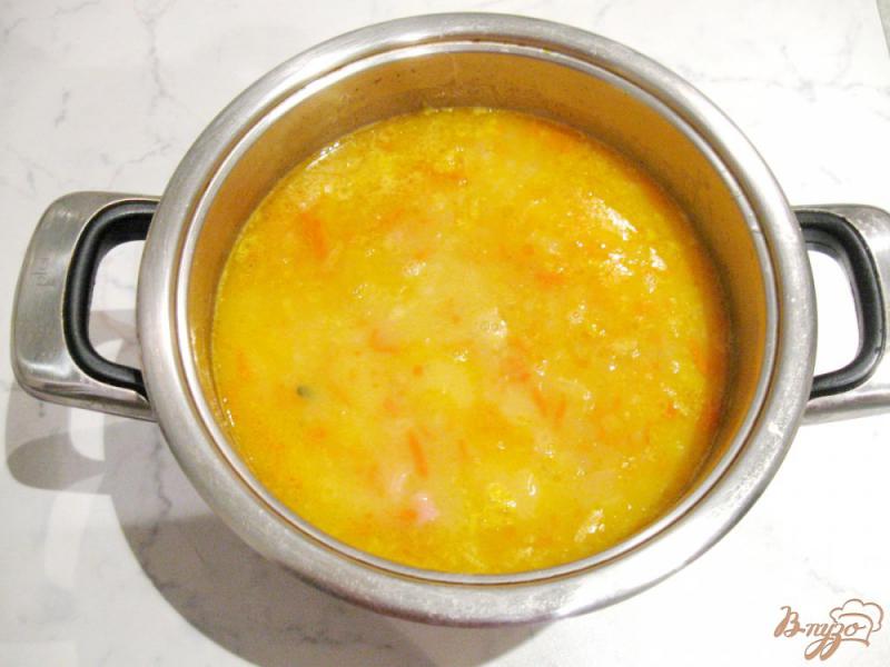 Фото приготовление рецепта: Гороховый суп с красной чечевицей шаг №9