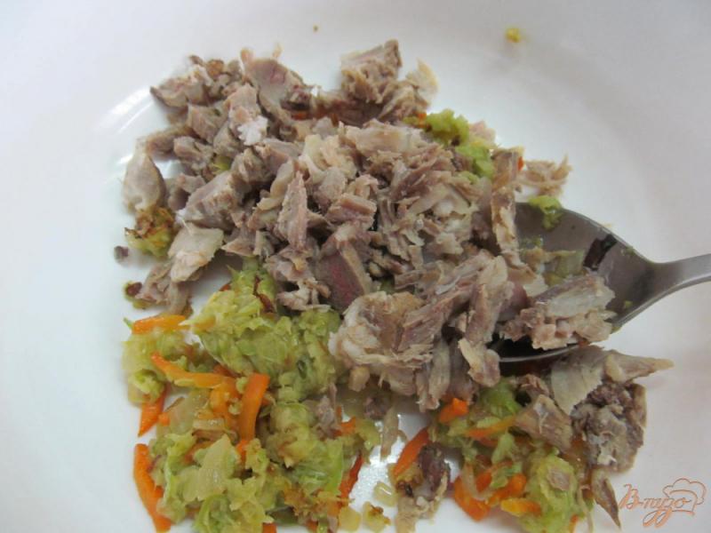 Фото приготовление рецепта: Запеканка с мясом кабачками и рисом шаг №4