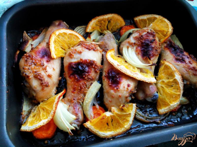 Фото приготовление рецепта: Куриные голени с апельсинами шаг №7