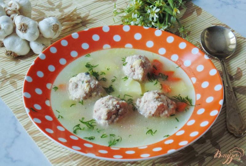 Фото приготовление рецепта: Суп с освяными хлопьями и фрикадельками шаг №8