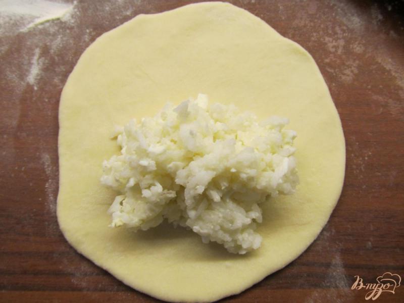 Фото приготовление рецепта: Пирожки с рисом в духовке шаг №12