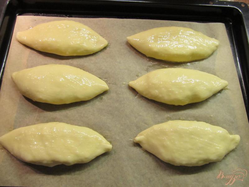 Фото приготовление рецепта: Пирожки с рисом в духовке шаг №15