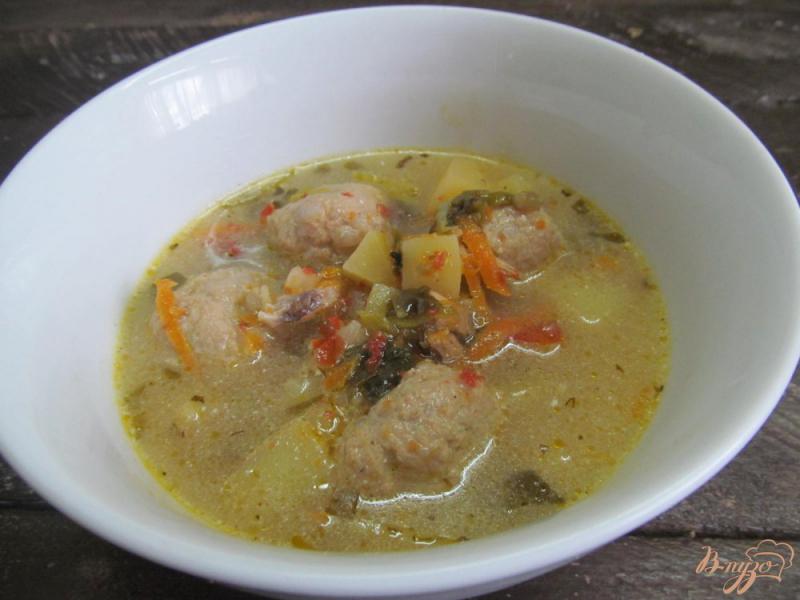 Фото приготовление рецепта: Суп с фрикадельки и щавелем шаг №9