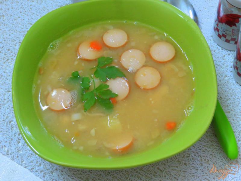 Фото приготовление рецепта: Гороховый суп на бульоне с сосисками шаг №9