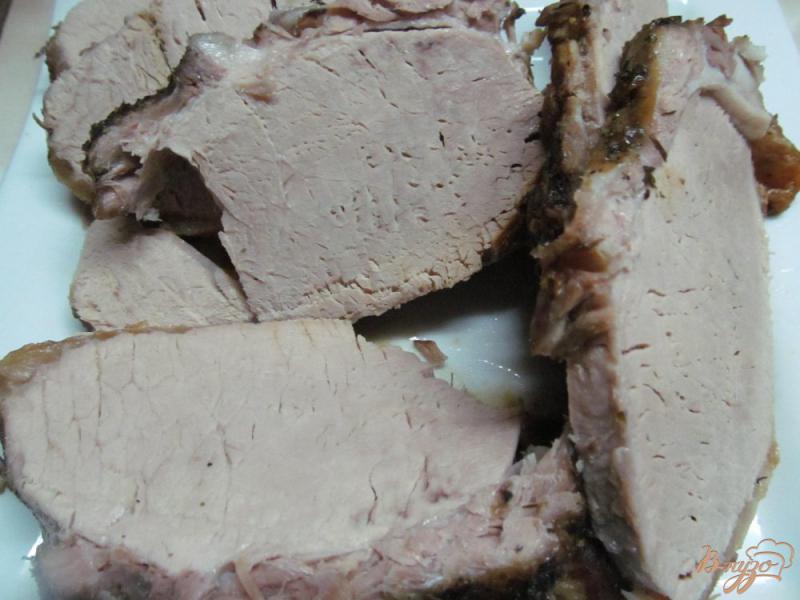 Фото приготовление рецепта: Свинина с клюквой и изюмом в мультиварке шаг №8