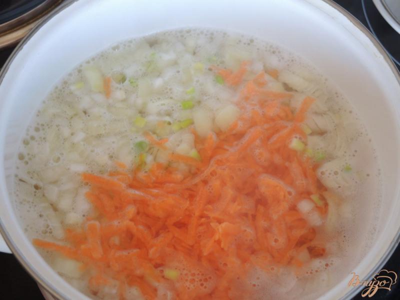 Фото приготовление рецепта: Суп с рыбными фрикадельками шаг №9