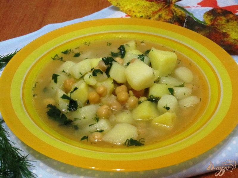 Фото приготовление рецепта: Суп с нутом и картофелем шаг №10