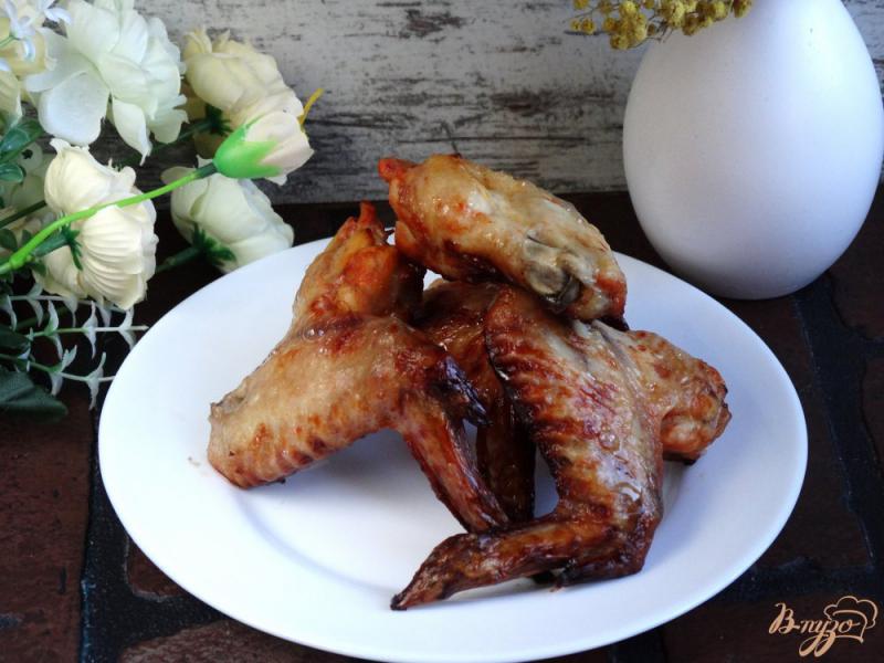 Фото приготовление рецепта: Куриные крылышки в остром томатном маринаде шаг №5