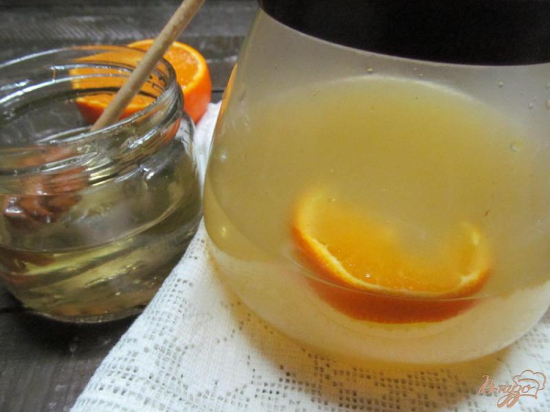 Фото приготовление рецепта: Апельсиновый чай шаг №6