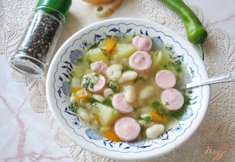 Фото приготовление рецепта: Фасолевый суп с сосисками шаг №8