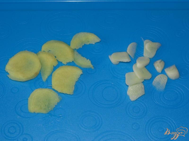 Фото приготовление рецепта: Малосольные огурчики с имбирем шаг №3