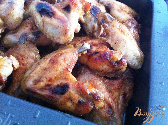 Фото приготовление рецепта: Куриные крылья барбекю из духовки шаг №6