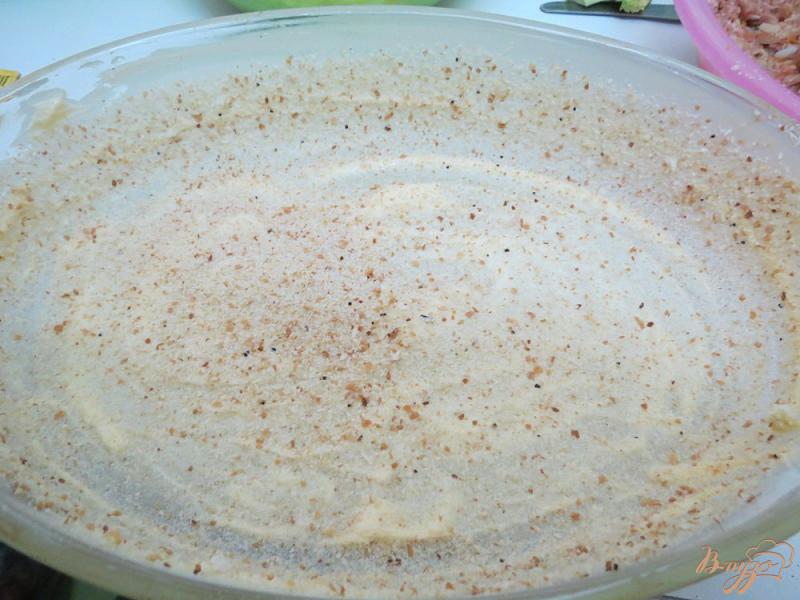 Фото приготовление рецепта: Запеканка с рисом,фаршем и брокколи шаг №9